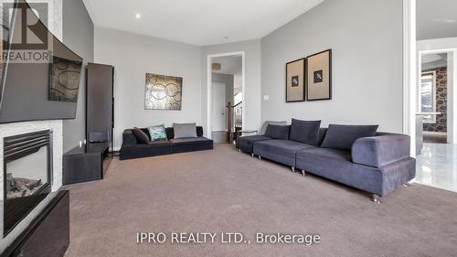 4 Quatro Crescent, Brampton (Bram East), ON - Indoor Photo Showing Living Room With Fireplace