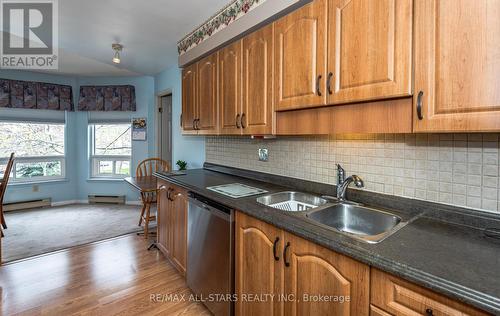 207 - 111 Grew Boulevard, Georgina, ON - Indoor Photo Showing Kitchen With Double Sink