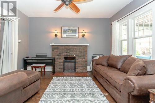 9 Erie Avenue, London, ON - Indoor Photo Showing Living Room With Fireplace