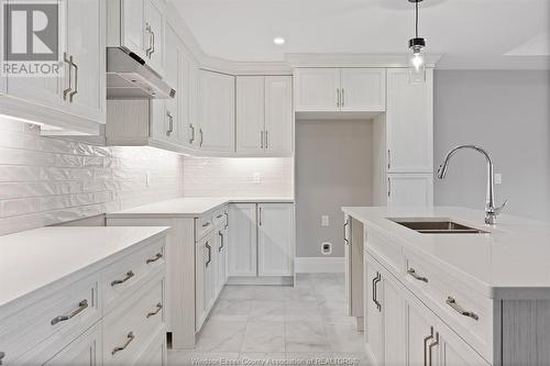 104 Jones Street, Essex, ON - Indoor Photo Showing Kitchen With Double Sink