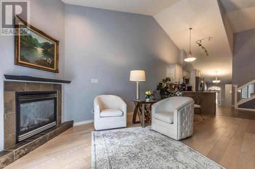 417 Sand Point Court, Windsor, ON - Indoor Photo Showing Living Room With Fireplace