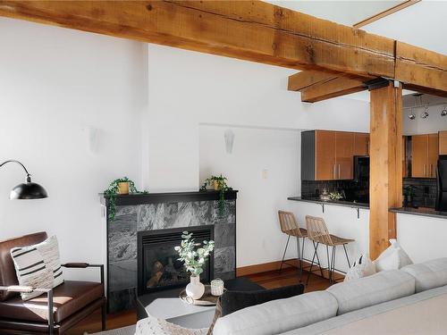 318-599 Pandora Ave, Victoria, BC - Indoor Photo Showing Living Room With Fireplace