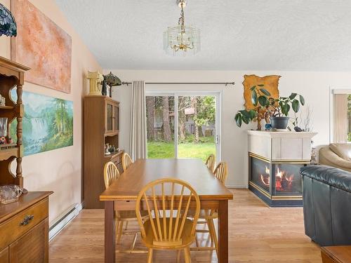 678 Cartmel Close, Langford, BC - Indoor Photo Showing Dining Room With Fireplace