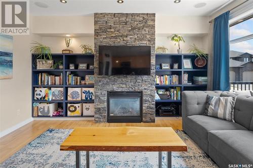 406 Wilkins Crescent, Saskatoon, SK - Indoor Photo Showing Living Room With Fireplace