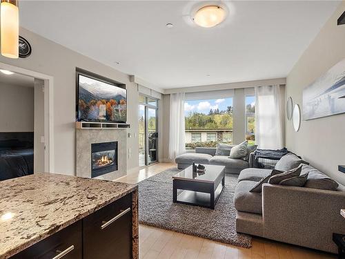 204-3223 Selleck Way, Colwood, BC - Indoor Photo Showing Living Room With Fireplace