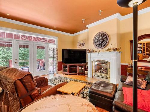 Salon - 212 Ch. De La Pente-Douce, Saint-Sauveur, QC - Indoor Photo Showing Living Room With Fireplace