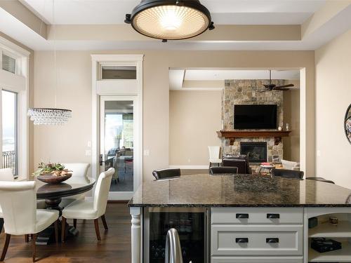 1804 Birkdale Avenue, Kelowna, BC - Indoor Photo Showing Dining Room With Fireplace