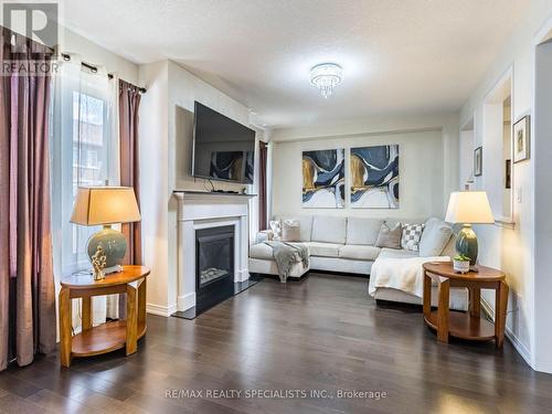 5 Fryent Street, Brampton, ON - Indoor Photo Showing Living Room With Fireplace