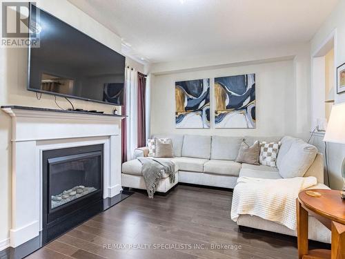 5 Fryent Street, Brampton, ON - Indoor Photo Showing Living Room With Fireplace