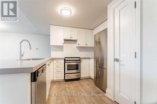 208 - 760 Lakeshore Road E, Mississauga, ON - Indoor Photo Showing Kitchen With Stainless Steel Kitchen With Upgraded Kitchen