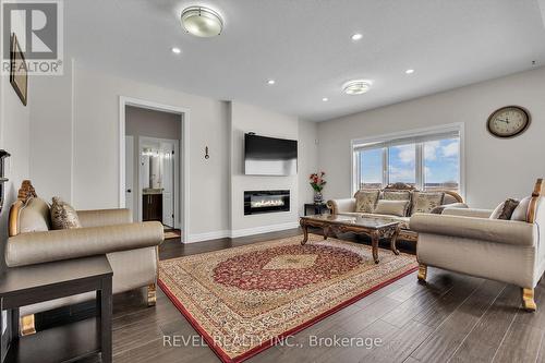 22 Morris Street, Brant, ON - Indoor Photo Showing Living Room With Fireplace