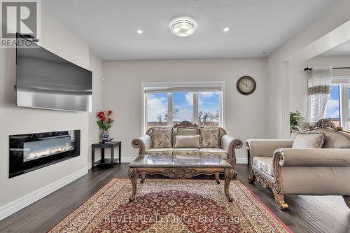 22 Morris Street, Brant, ON - Indoor Photo Showing Living Room With Fireplace