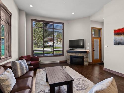 19-3280 Village Way, Sun Peaks, BC - Indoor Photo Showing Living Room With Fireplace