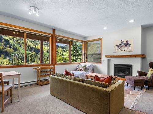 2417 Fairways Drive, Sun Peaks, BC - Indoor Photo Showing Living Room With Fireplace