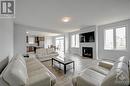 Family Room - 182 Yearling Circle, Ottawa, ON  - Indoor Photo Showing Living Room With Fireplace 