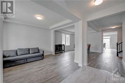 living room with dining room - 182 Yearling Circle, Ottawa, ON - Indoor