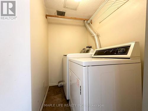 507 - 55 Bamburgh Circle, Toronto, ON - Indoor Photo Showing Laundry Room