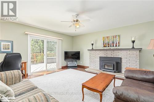 1768 8 Concession S, Clearview, ON - Indoor Photo Showing Living Room With Fireplace