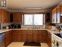 605 1St Avenue, Raymore, SK  - Indoor Photo Showing Kitchen With Double Sink 