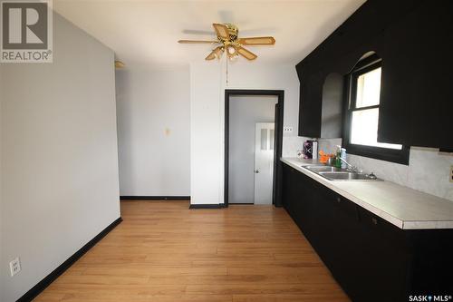 792 Centre Street, Shaunavon, SK - Indoor Photo Showing Kitchen With Double Sink