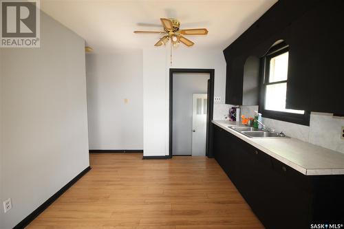 792 Centre Street, Shaunavon, SK - Indoor Photo Showing Kitchen With Double Sink