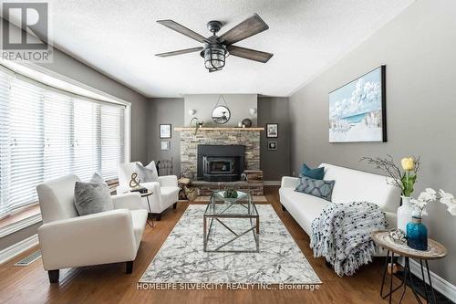 374136 6Th Line, Amaranth, ON - Indoor Photo Showing Living Room With Fireplace