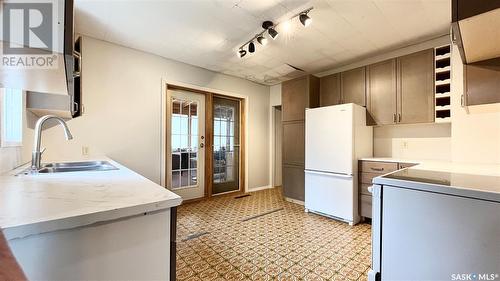 207 1St Street E, Meath Park, SK - Indoor Photo Showing Kitchen With Double Sink