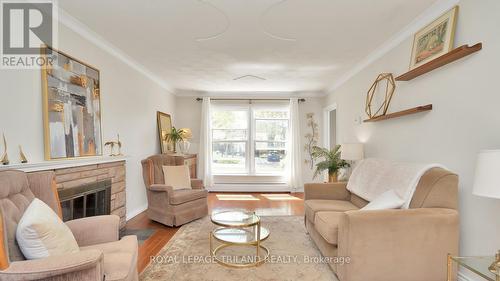 42 Torrington Crescent, London, ON - Indoor Photo Showing Living Room With Fireplace