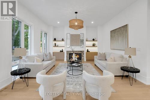 16 Cadillac Avenue, Toronto (Clanton Park), ON - Indoor Photo Showing Living Room With Fireplace