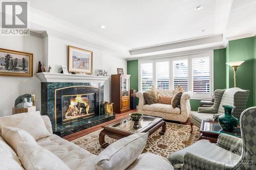 33 Durham Private, Ottawa, ON - Indoor Photo Showing Living Room With Fireplace