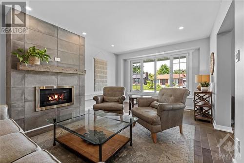 1322 Fontenay Crescent, Ottawa, ON - Indoor Photo Showing Living Room With Fireplace