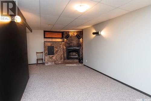 412 4Th Street E, Wynyard, SK - Indoor Photo Showing Other Room With Fireplace