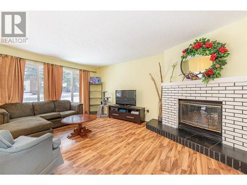 801 26 Street Se Lot# 1, Salmon Arm, BC - Indoor Photo Showing Living Room With Fireplace