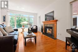 Bright Living Room with Gas Fireplace - 