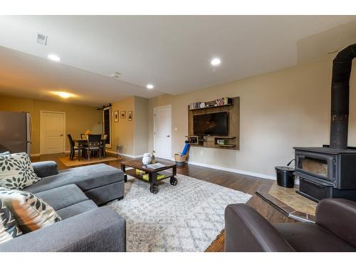 1504 Poplar Street, Golden, BC - Indoor Photo Showing Living Room With Fireplace
