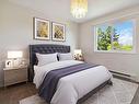 406-1571 Mortimer St, Saanich, BC  - Indoor Photo Showing Bedroom 