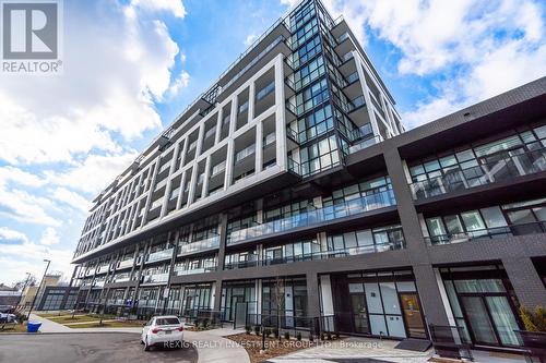 301 - 50 George Butchart Drive, Toronto, ON - Outdoor With Facade