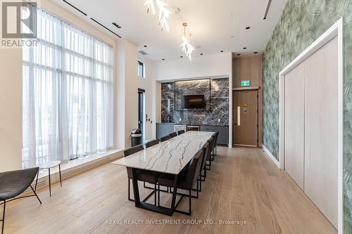 301 - 50 George Butchart Drive, Toronto, ON - Indoor With Fireplace