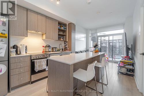 301 - 50 George Butchart Drive, Toronto, ON - Indoor Photo Showing Kitchen