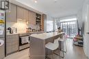 301 - 50 George Butchart Drive, Toronto, ON  - Indoor Photo Showing Kitchen 