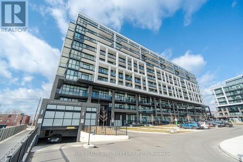 301 - 50 George Butchart Drive, Toronto, ON - Outdoor With Facade