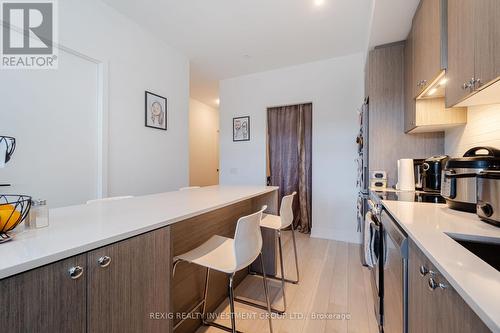 301 - 50 George Butchart Drive, Toronto, ON - Indoor Photo Showing Kitchen