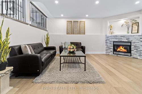 3256 Dominion Road, Fort Erie, ON - Indoor Photo Showing Living Room With Fireplace