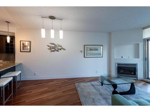 S308-737 Humboldt St, Victoria, BC - Indoor Photo Showing Living Room With Fireplace