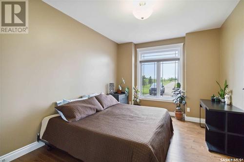 35 Sunrise Drive, Blackstrap Skyview, SK - Indoor Photo Showing Bedroom