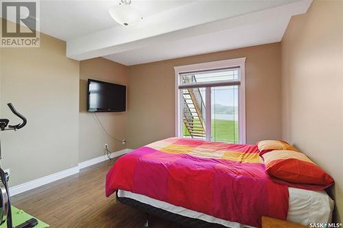 35 Sunrise Drive, Blackstrap Skyview, SK - Indoor Photo Showing Bedroom