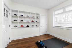 Family room/flexible room for home gym/office behind garage - 
