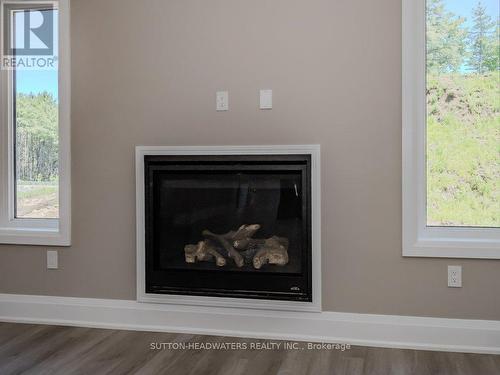 44 Dyer Crescent, Bracebridge, ON - Indoor Photo Showing Living Room With Fireplace