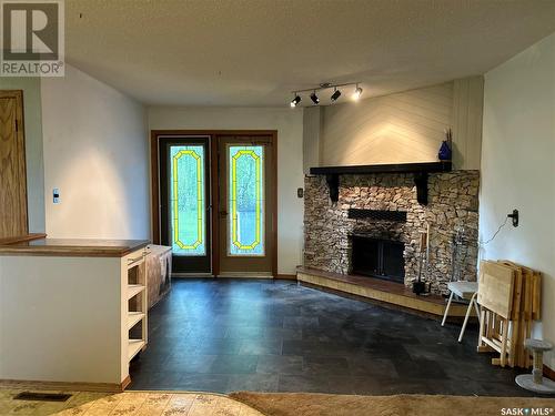 Wilson Acreage, Annaheim, SK - Indoor Photo Showing Living Room With Fireplace