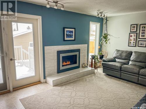 402 Main Street, St. Brieux, SK - Indoor Photo Showing Living Room With Fireplace